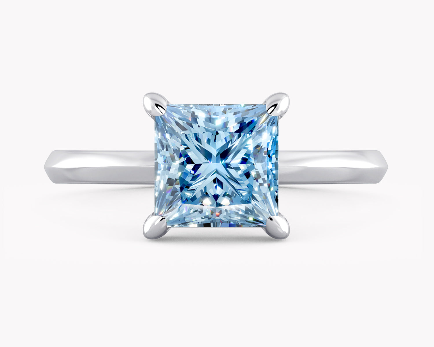 Verlobungsring Weißgold 750 mit blauem Diamanten im Prinzess Schliff, handgefertigt von Goldschmieden by RYIA Fine Jewelry