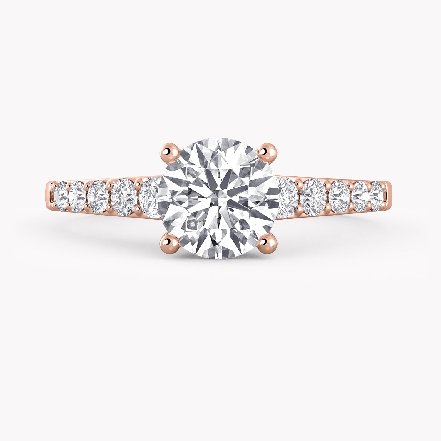 Primrose Verlobungsring Rosegold mit Brillant-Schliff Diamanten und Seitendiamanten von RYIA Fine Jewelry