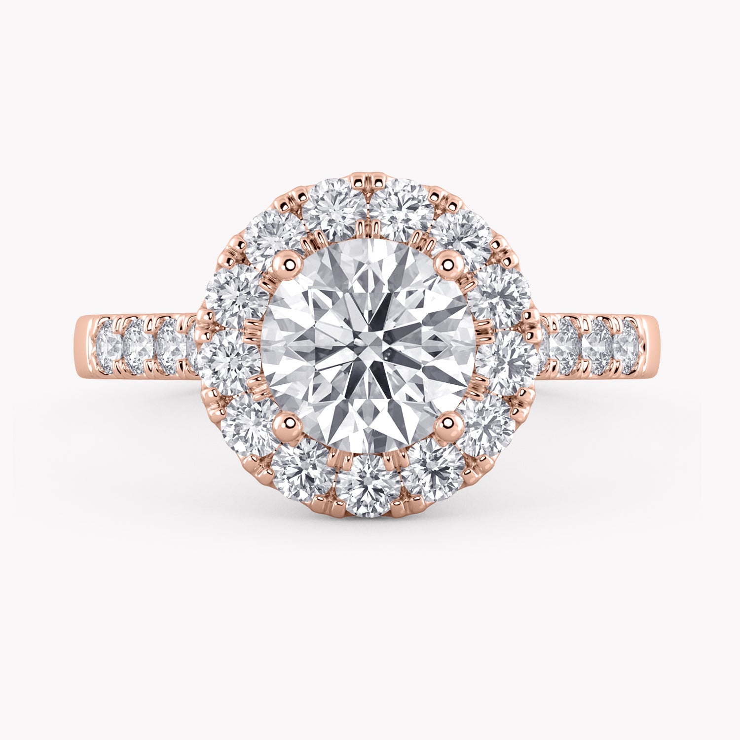 Halo-Verlobungsring Rosegold mit einem Solitär Labordiamanten im Brillantschliff und Seitendiamanten von RYIA Fine Jewelry