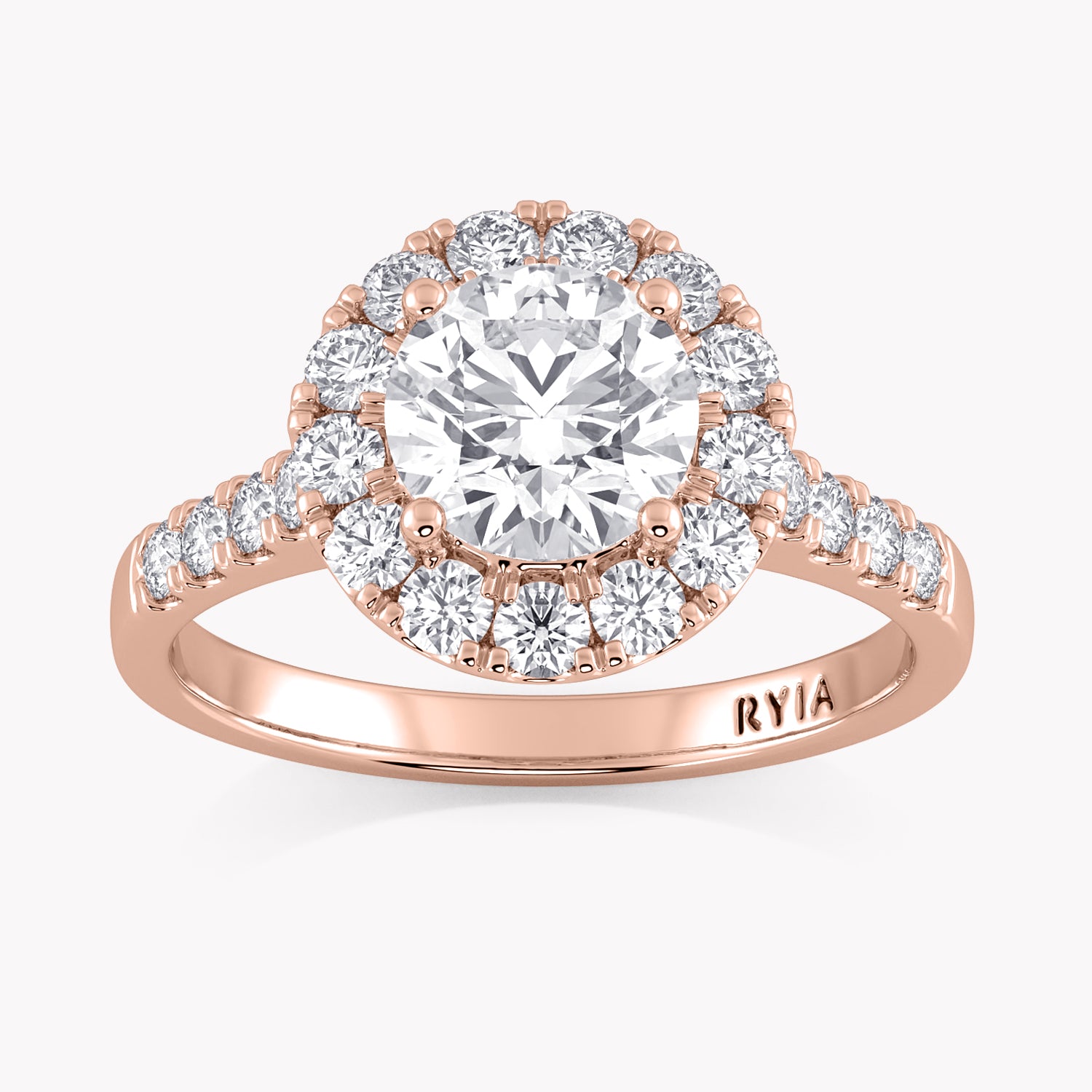 Halo-Verlobungsring Rosegold mit einem Solitär Labordiamanten im Brillantschliff und Seitendiamanten von RYIA Fine Jewelry