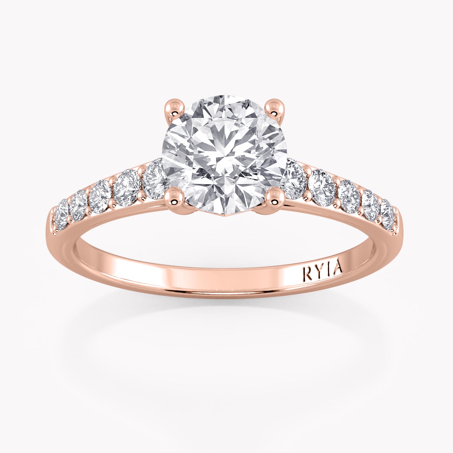 Primrose Verlobungsring Rosegold mit Brillant-Schliff Diamanten und Seitendiamanten von RYIA Fine Jewelry