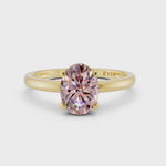 Handcrafted Bespoke Engagement Ring in Yellow Gold with an oval Lab Diamond in Fancy Vivid Pink Color