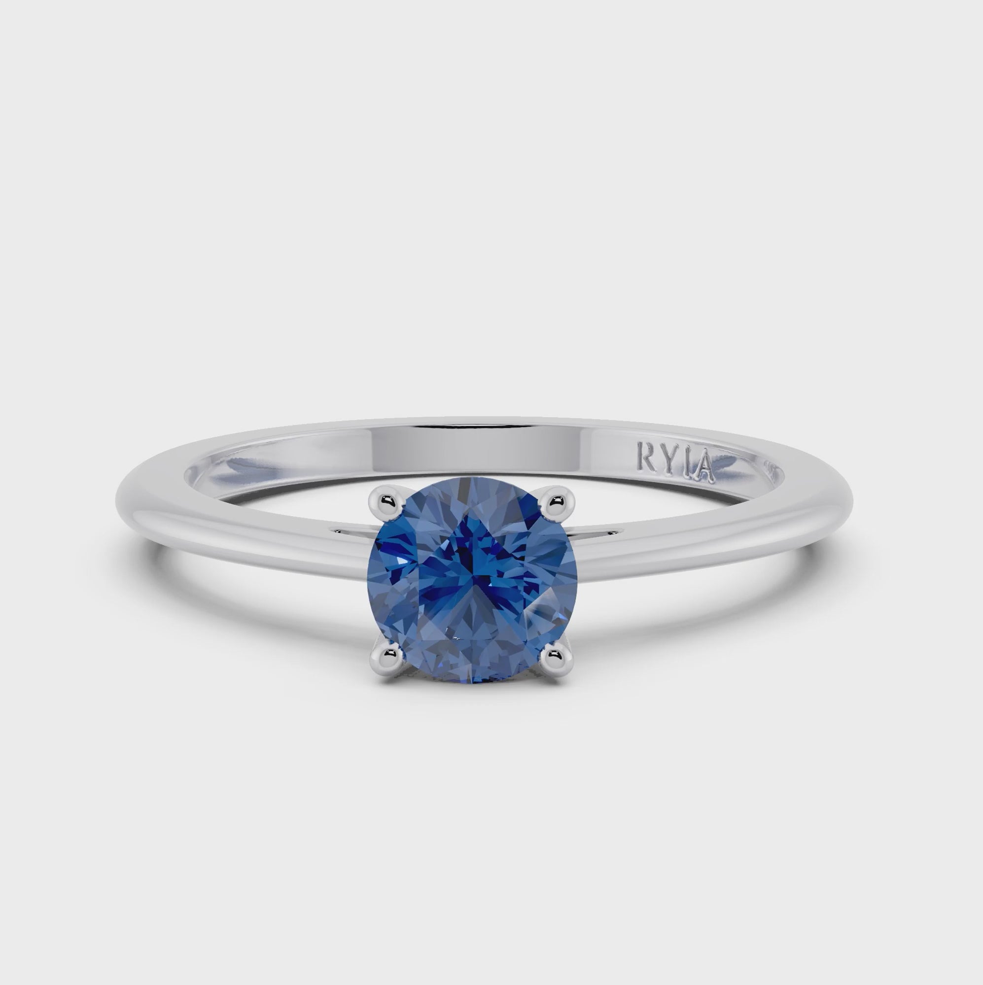 Sapphire Engagement Ring in White Gold by RYIA