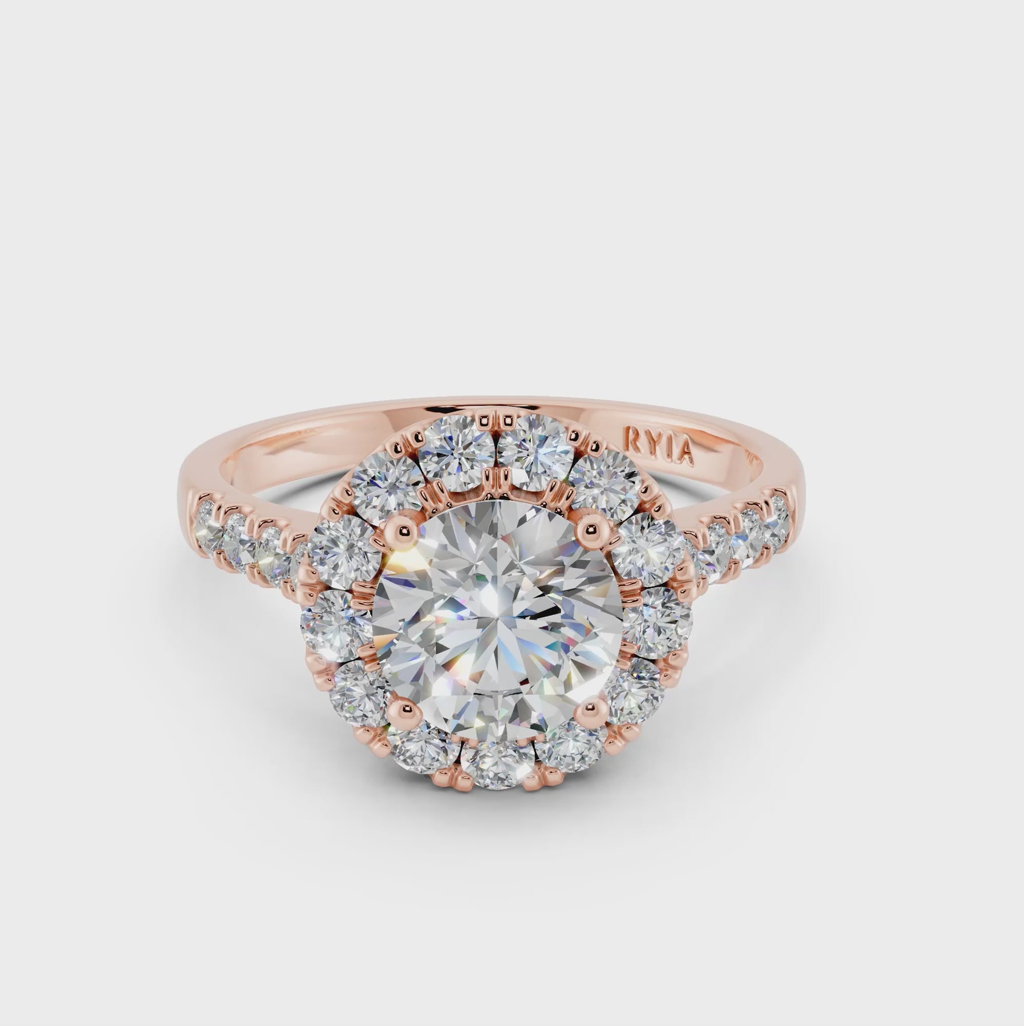 Halo-Verlobungsring Rosegold mit einem Solitär Labordiamanten im Brillantschliff und Seitendiamanten von RYIA Fine Jewelry