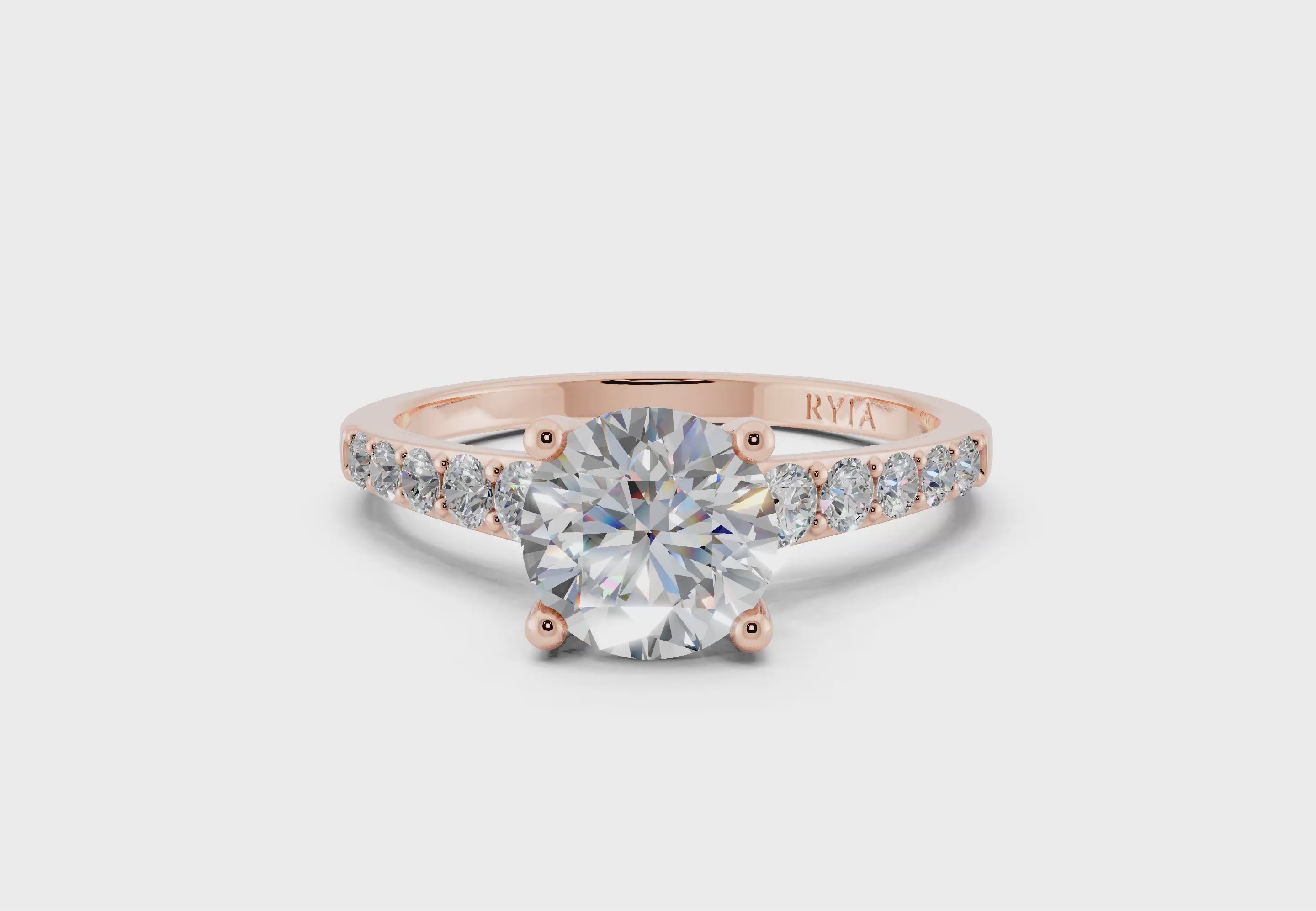 Primrose Verlobungsring Rosegold mit Brillant-Schliff Diamanten und Seitendiamanten von RYIA Fine Jewelry